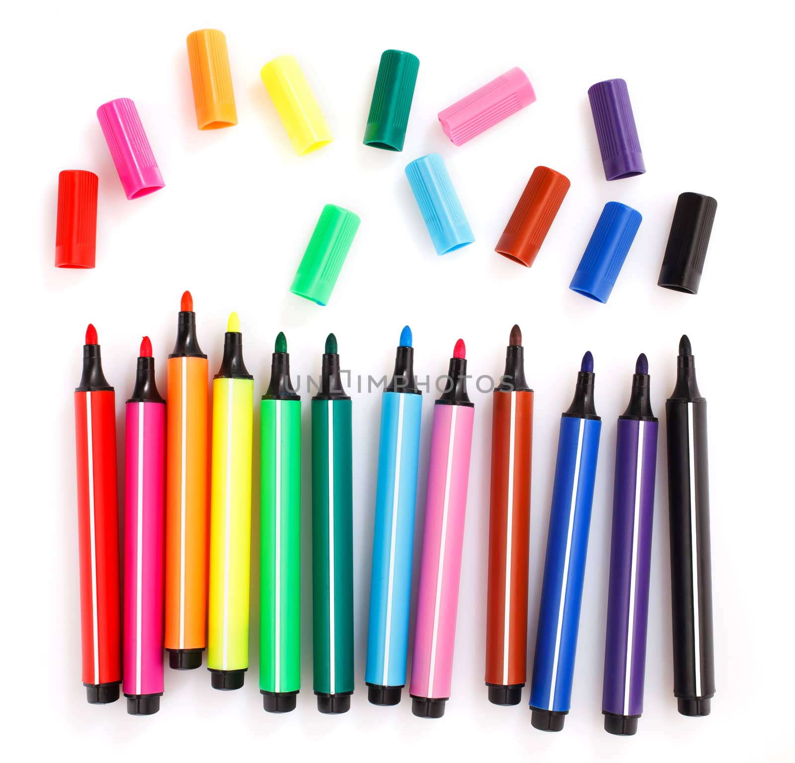 colored markers on the white background