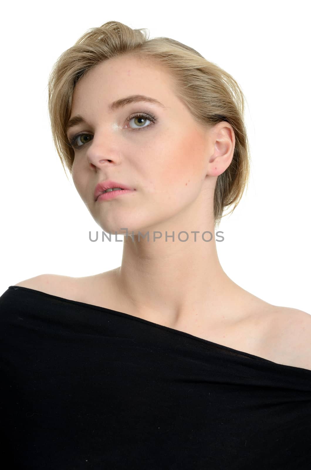 Female model portrait. Blond girl with nobel face expression, wearing black top.