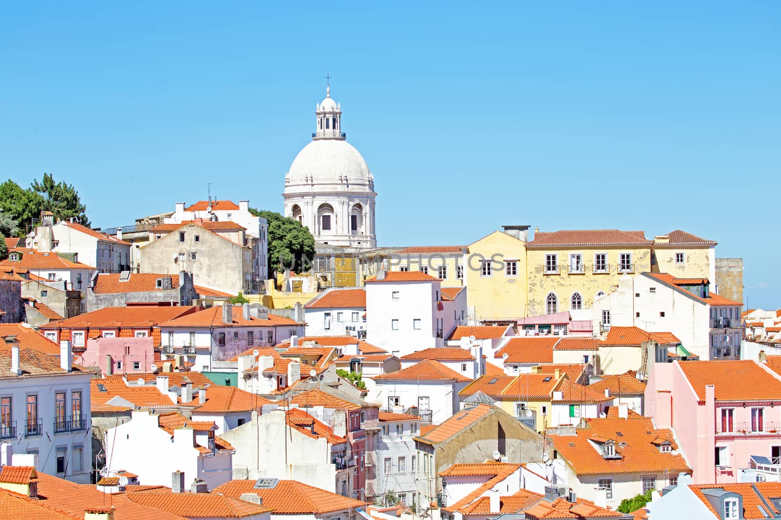 Bird view of central Lisbon with colorful houses and orange roofs