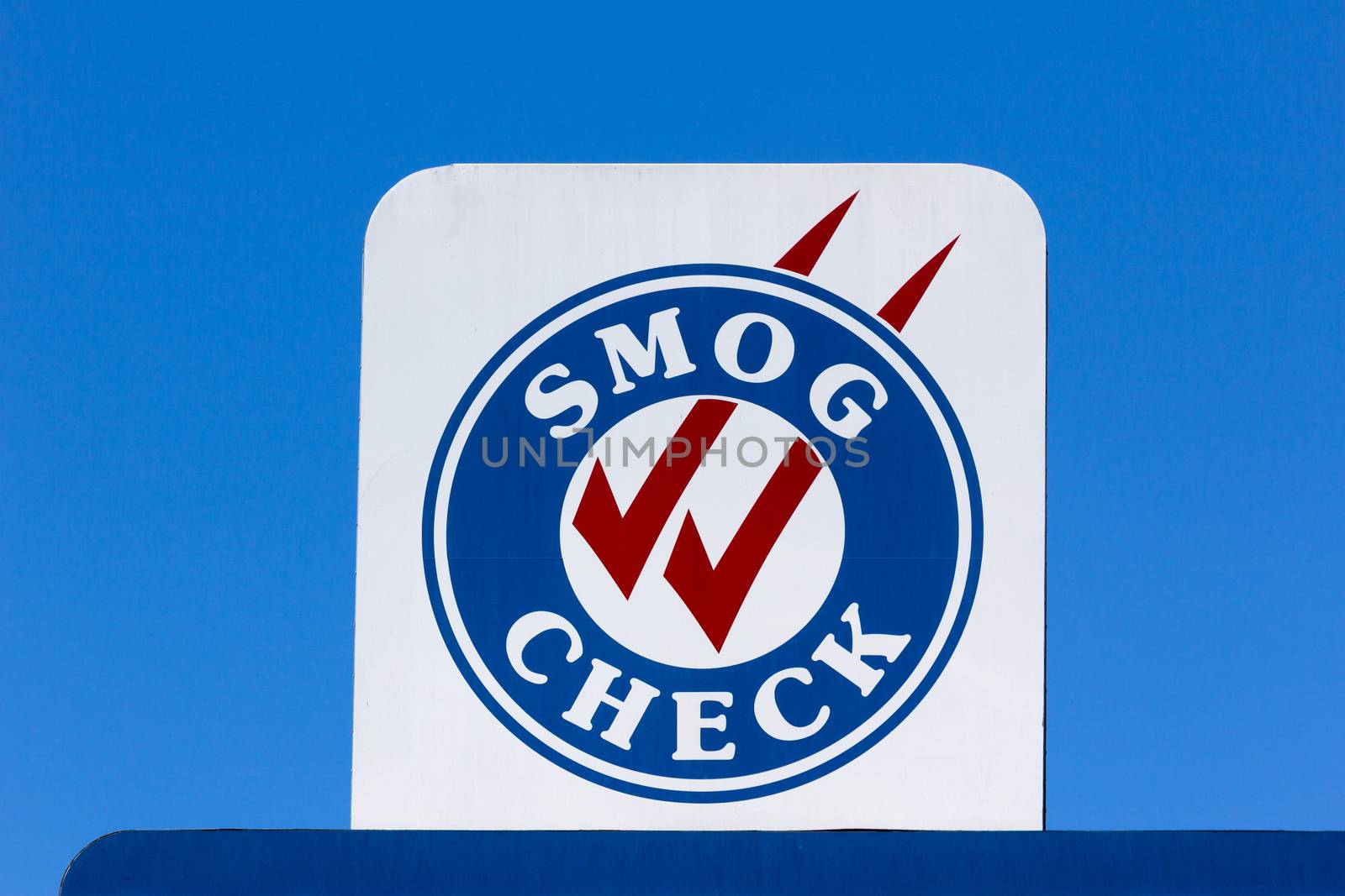 Smog Check sign at automotive repair shop in the United States