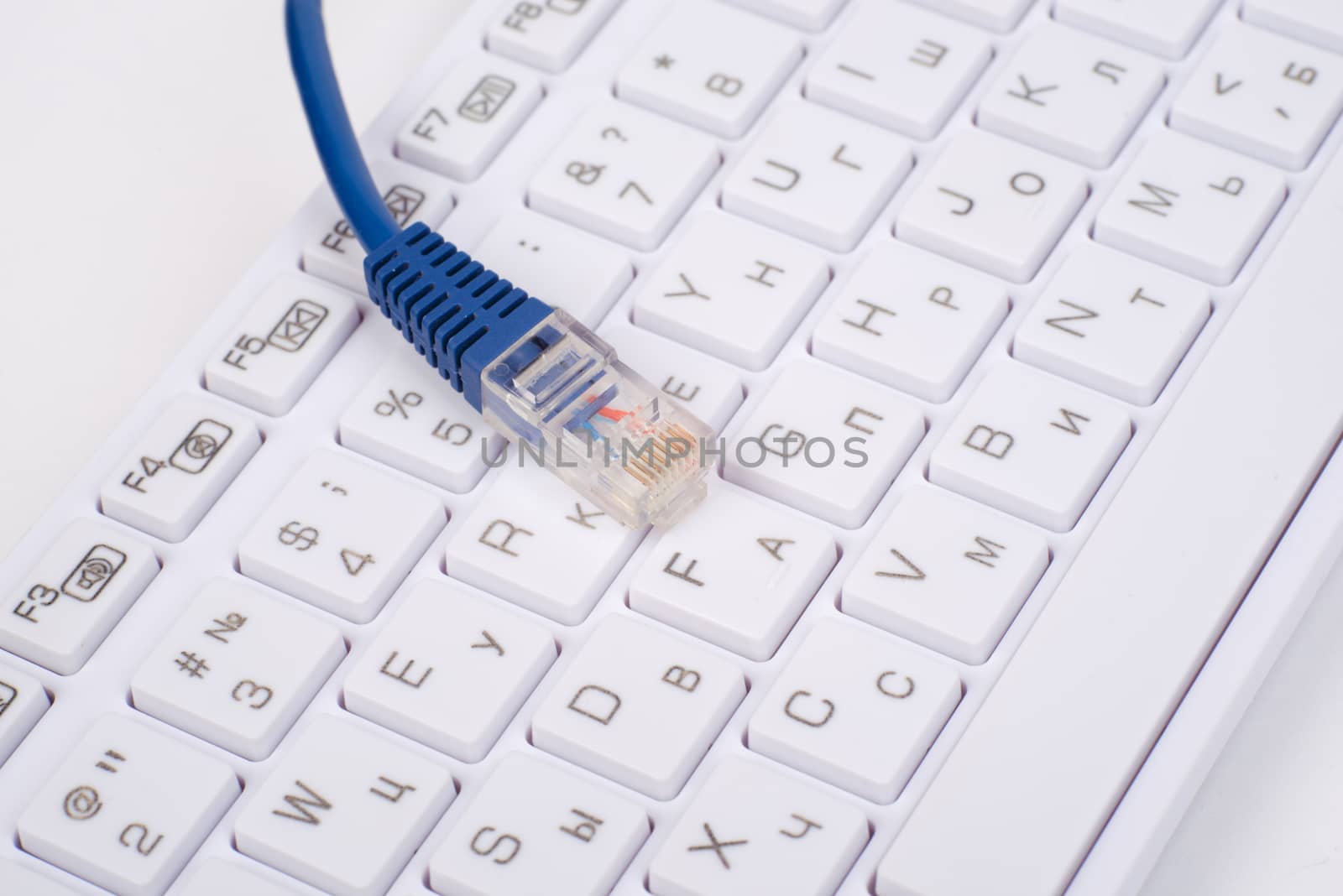 Computer keyboard with blue cable, close up view