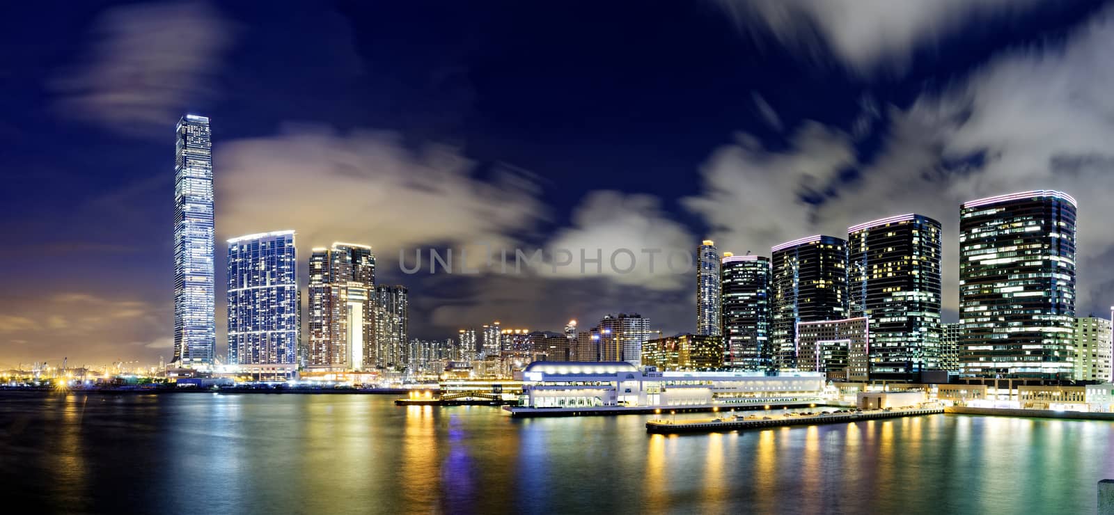 hong kong office buildings at night by cozyta