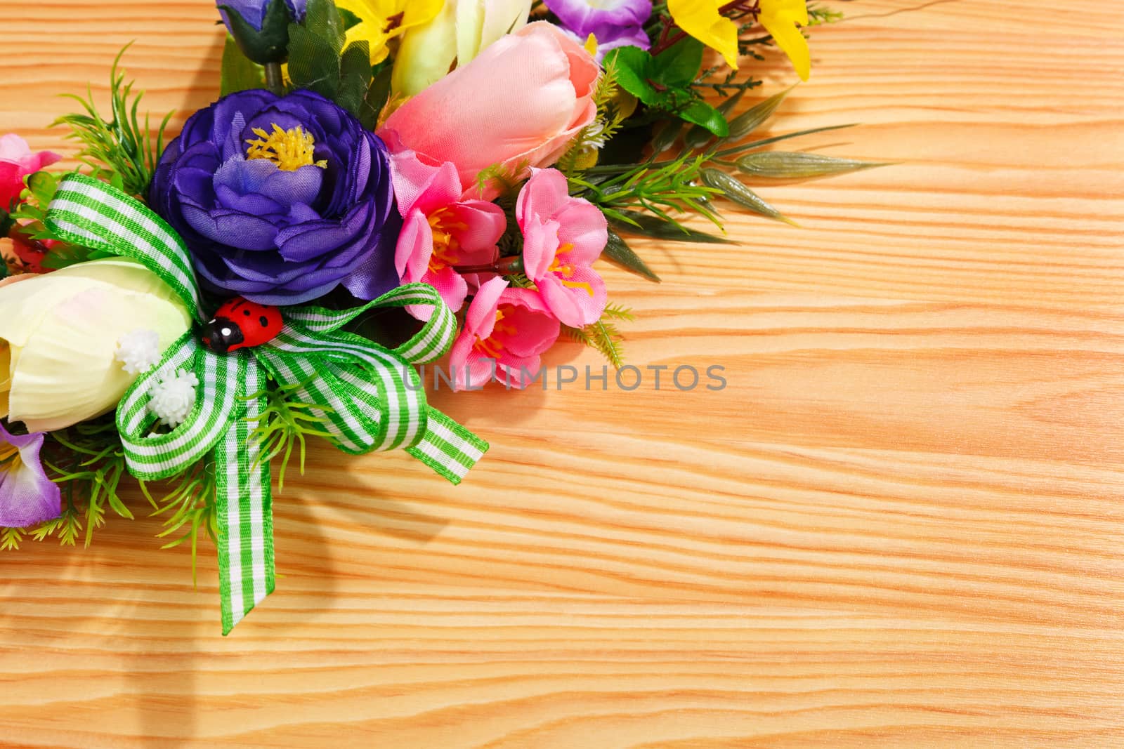 floral arrangement on a wooden texture