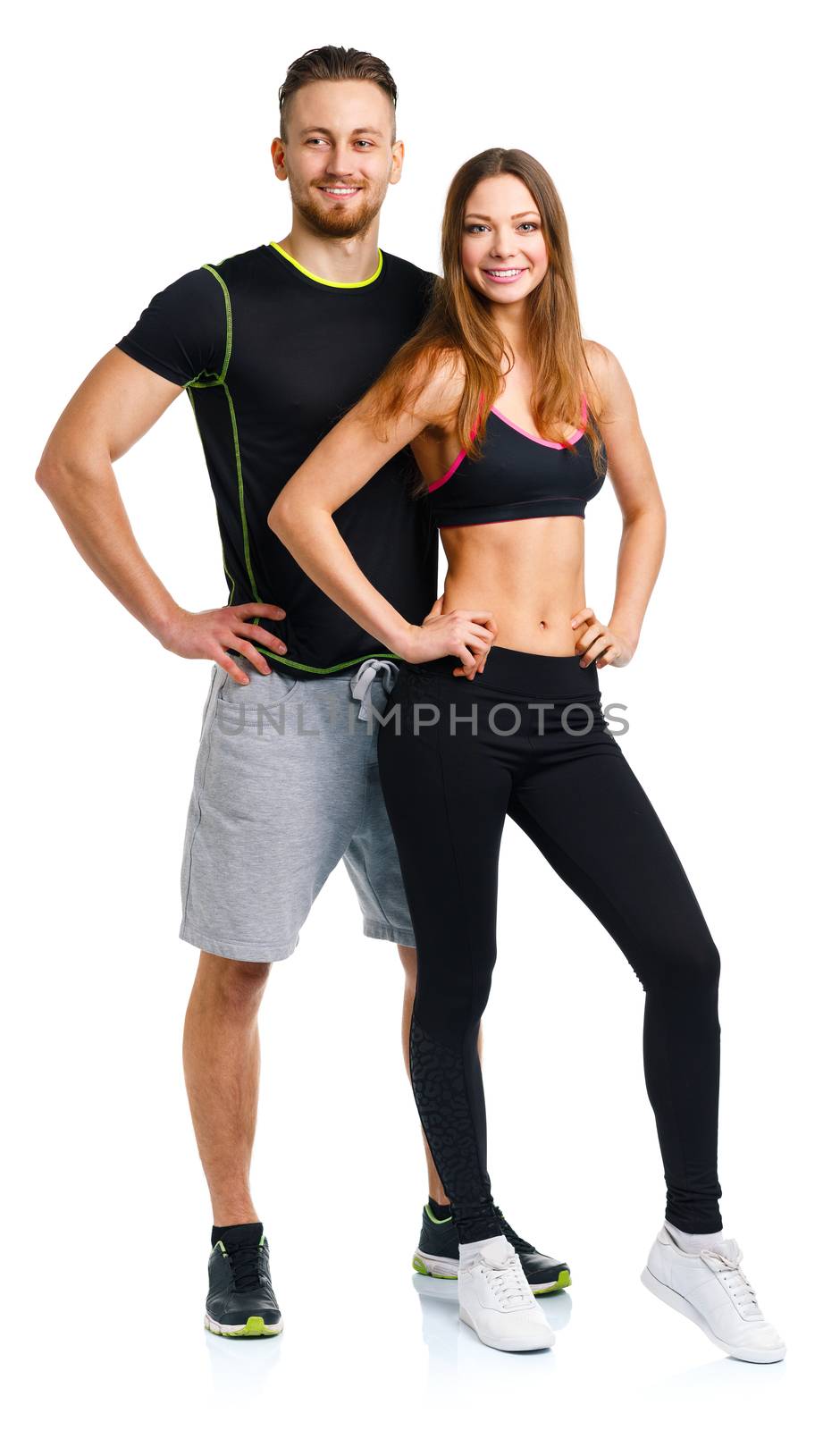Sport couple - man and woman after fitness exercise on the white by vlad_star