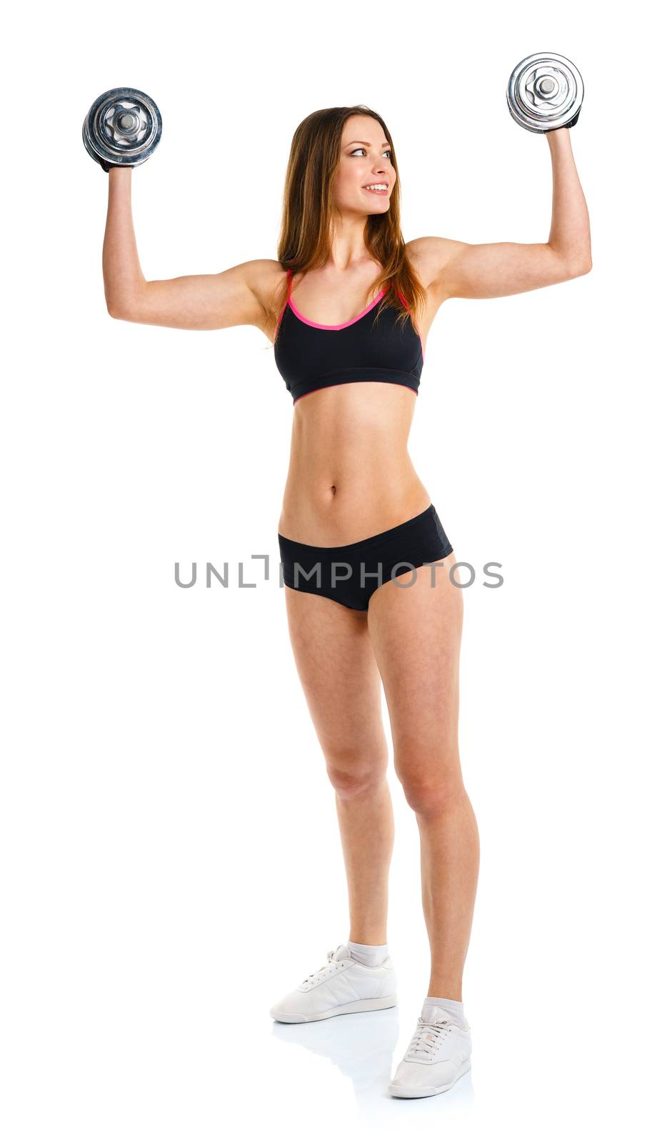 Happy athletic woman with dumbbells doing sport exercise, isolated on white background