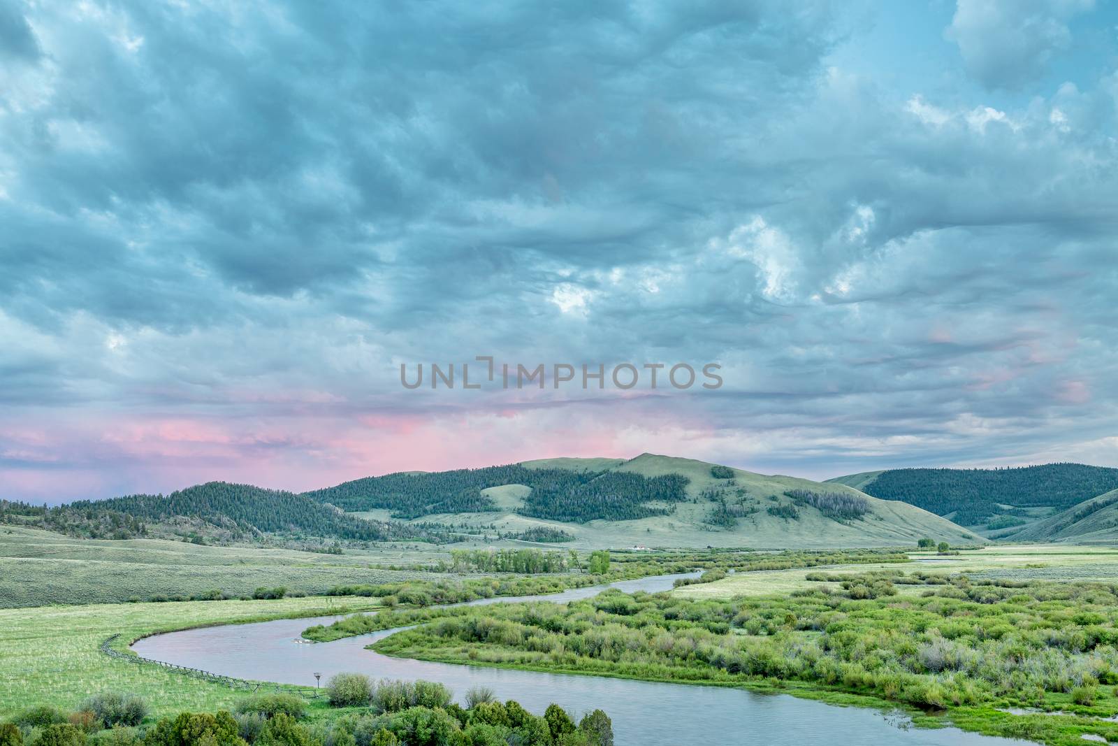 dusk over North Platte River in Colorado North park above Northgate Canyon, early summer scenery with waterfowl