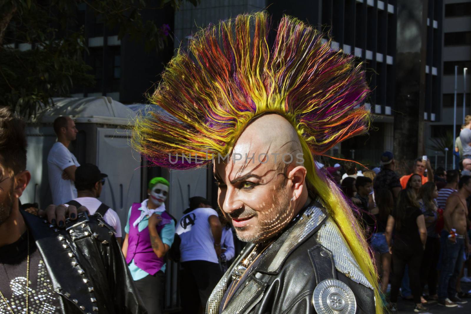 SAO PAULO, BRAZIL - June 7, 2015: An unidentified man  wearing costume and celebrating lesbian, gay, bisexual, and transgender culture in the 19º Pride Parade Sao Paulo.