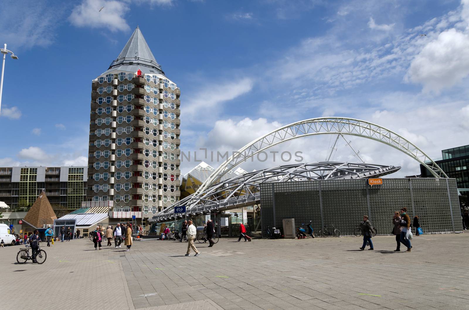 Rotterdam, Netherlands - May 9, 2015: Pencil tower, cube houses and Blaak Station in the center of the city on May 9, 2015, in Rotterdam, Blaak district, The Netherlands