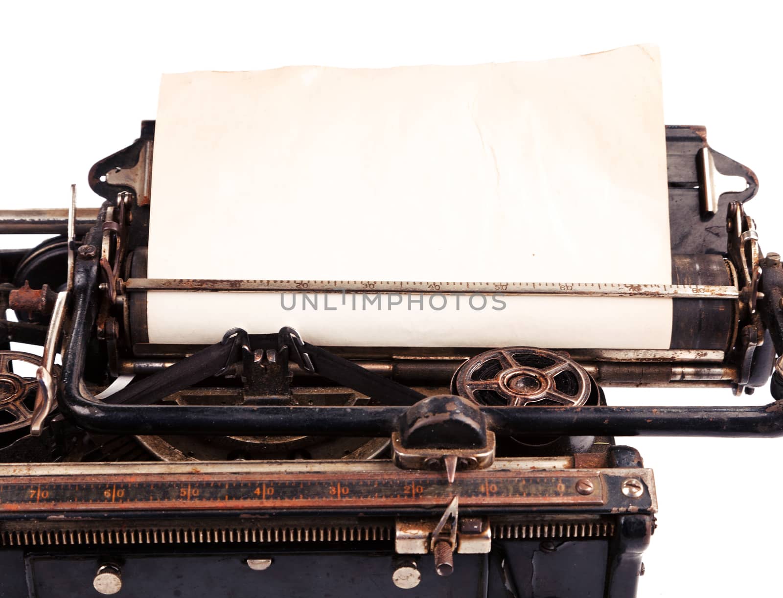 Old blank sheet of paper in the antique typewriter