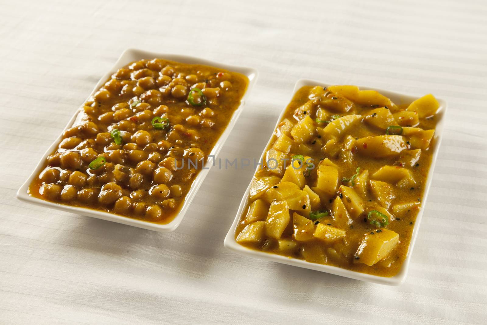 Indian/Pakistani cuisine Aaloo bhujia and Channa  by haiderazim