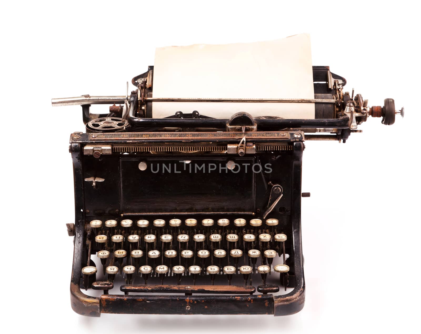 old fashioned, vintage typewriter with a blank sheet of paper 