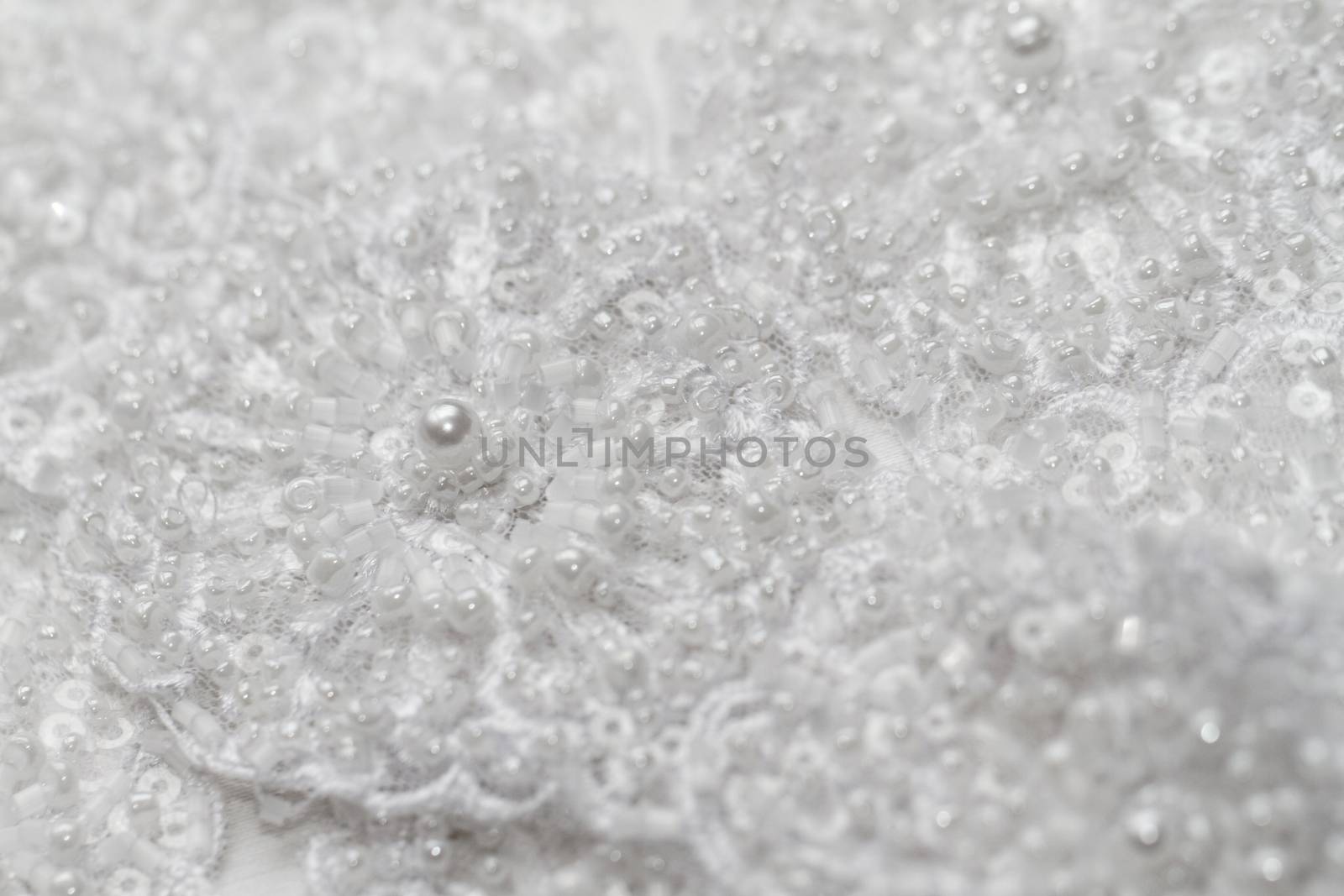 Luxury wedding lace with pearls on white background