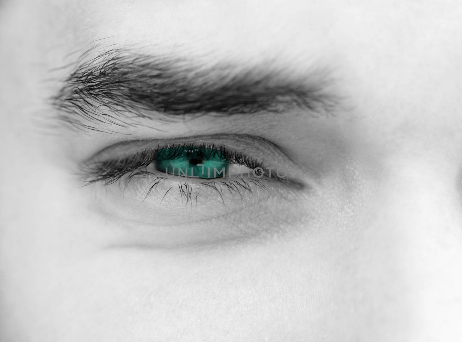 Close up photo of a beautiful young man's eyes