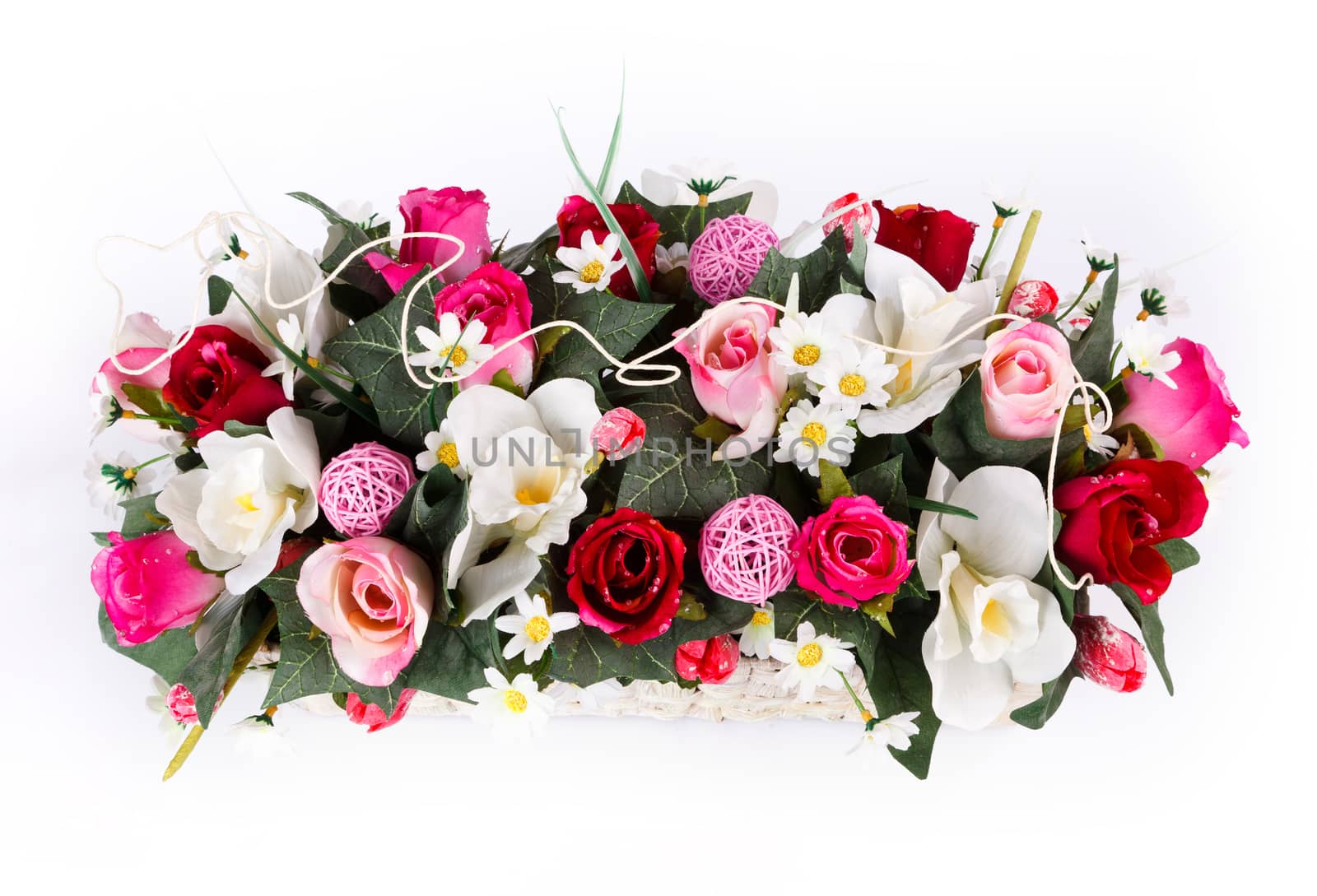 flowers in a basket isolated on white