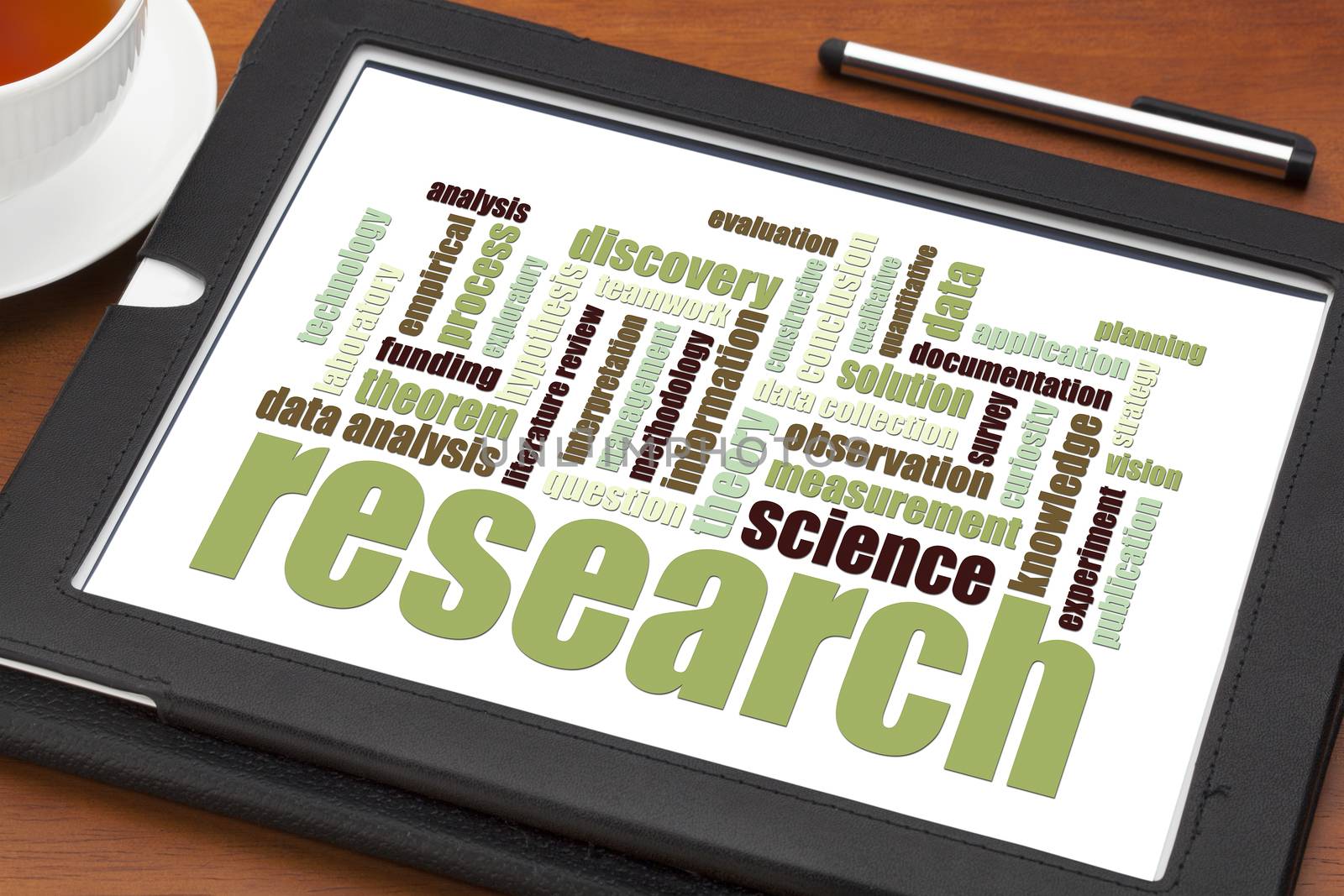 scientific  research word cloud on a digital tablet - science concept