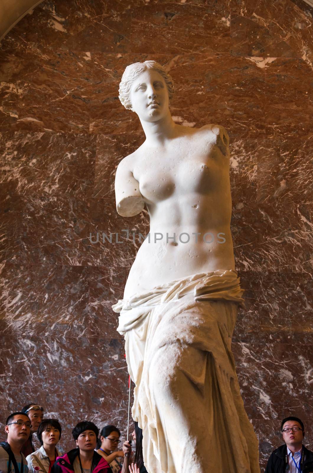 Paris, France - May 13, 2015: The Venus de Milo statue at the Louvre Museum in Paris. The Venus de Milo statue it's one of most important statue of the world.