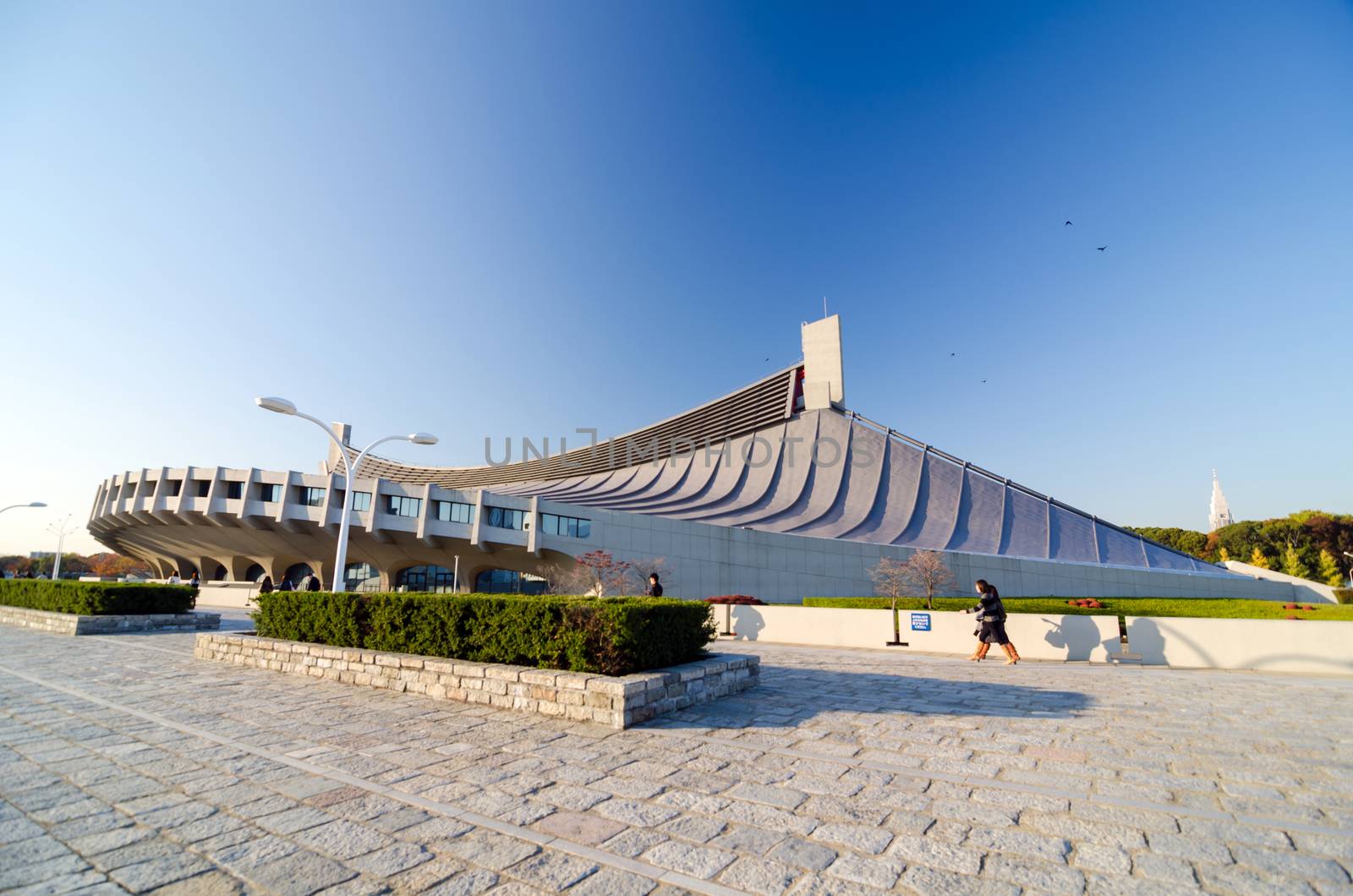 Tokyo, Japan - November 20, 2013: People visit Yoyogi National Gymnasium by siraanamwong