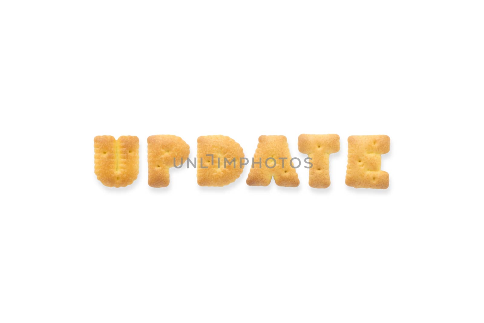 Collage of the capital letters word UPDATE. Alphabet cookie biscuits isolated on white background