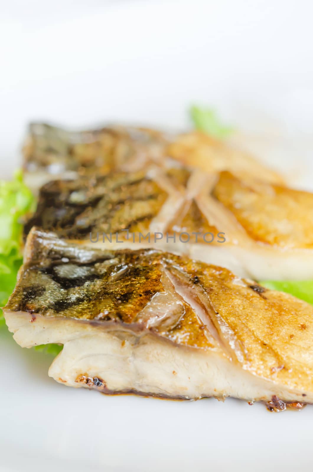 close up grilled fish, saba shioyaki japanese cuisine