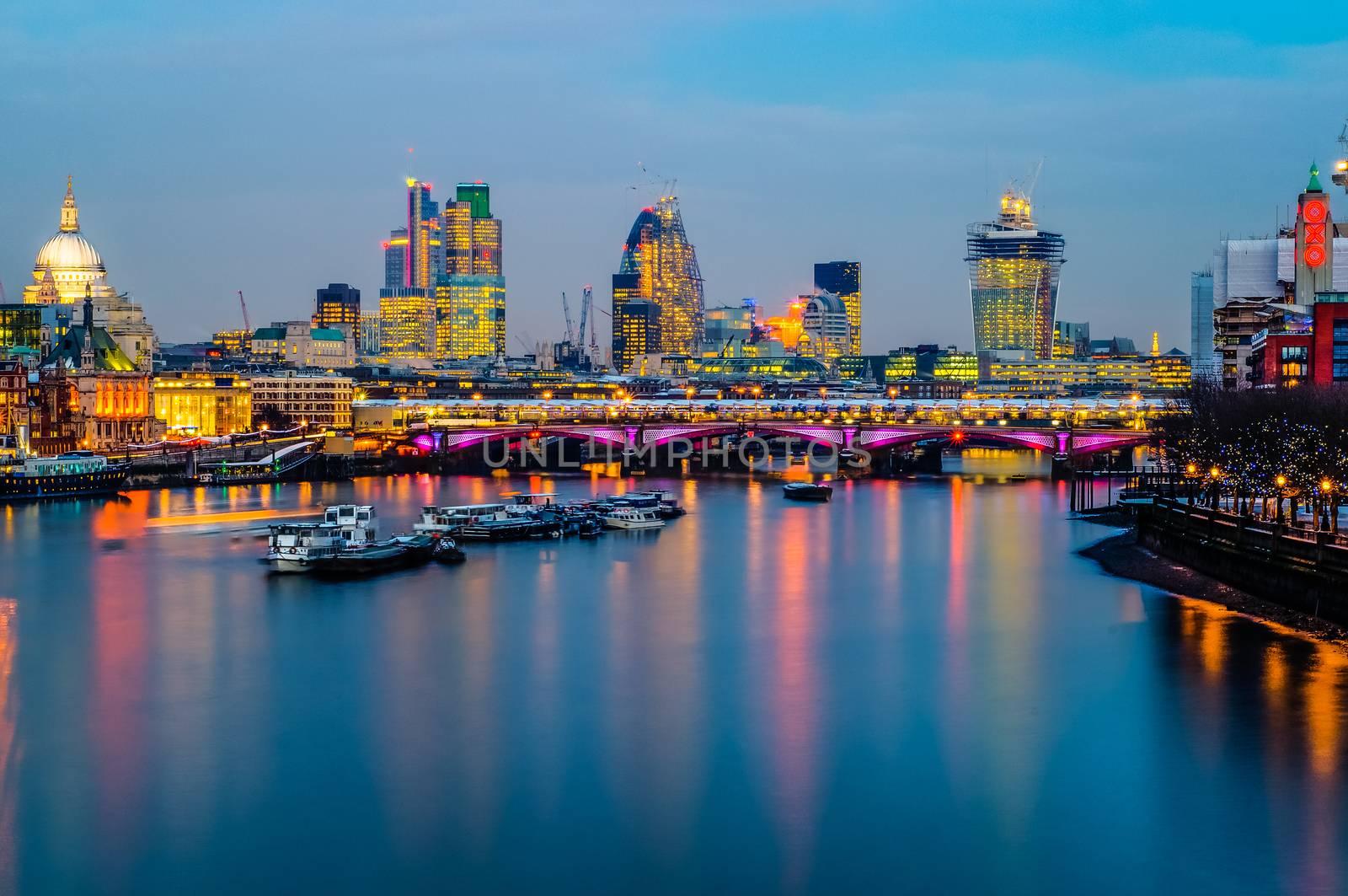 London Skyline - Blackfriars bridge, St Paul Cathedral, The City and the Oxo Tower, Thames River