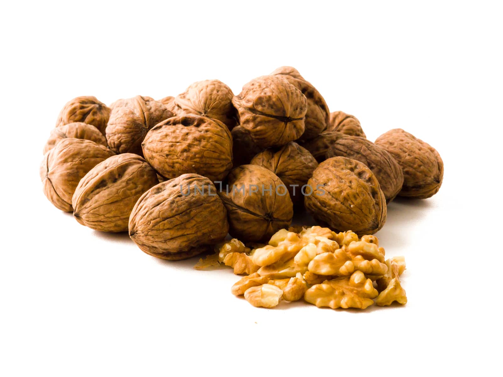 Brown walnuts isolated on white background.