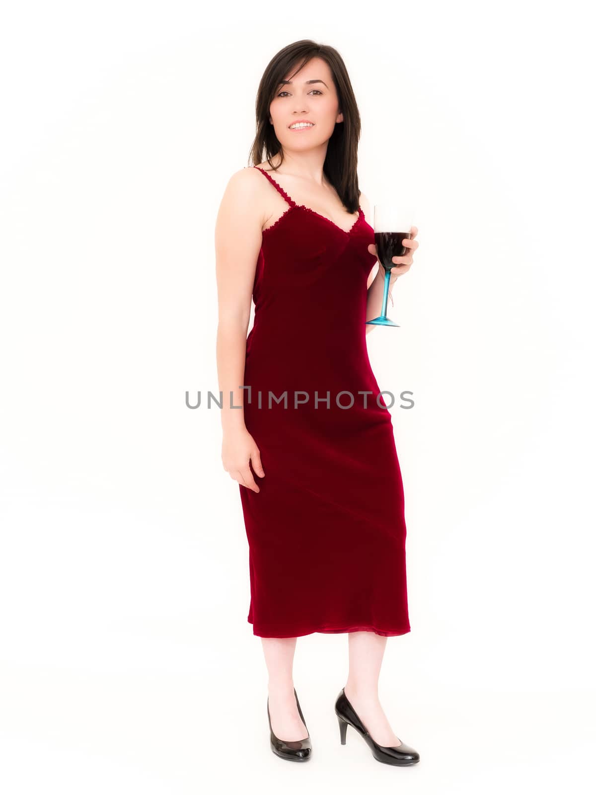 Beautiful Woman in a Red Dress Holding a Red Wine