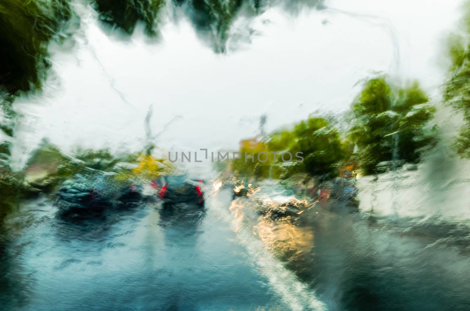 Traffic in heavy rain storm by jaaske