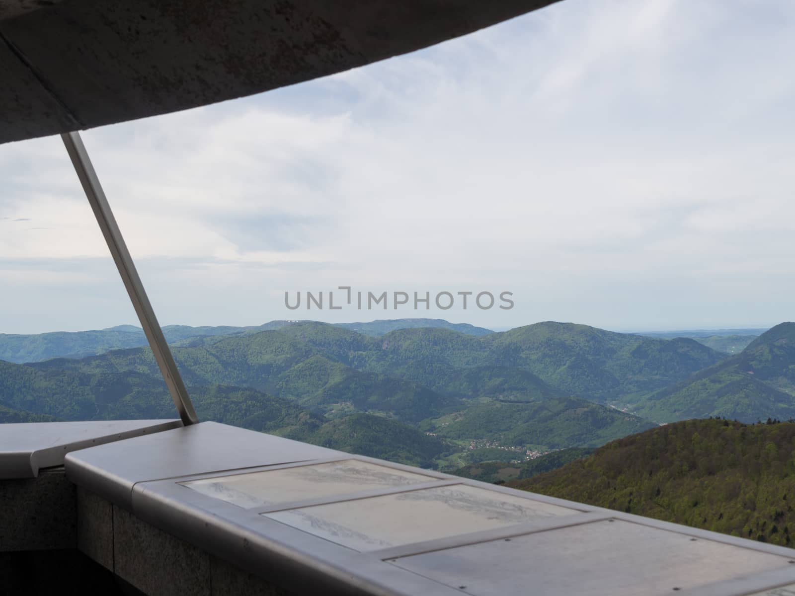 Looking out of the Vosges mountains from a stone lookout post