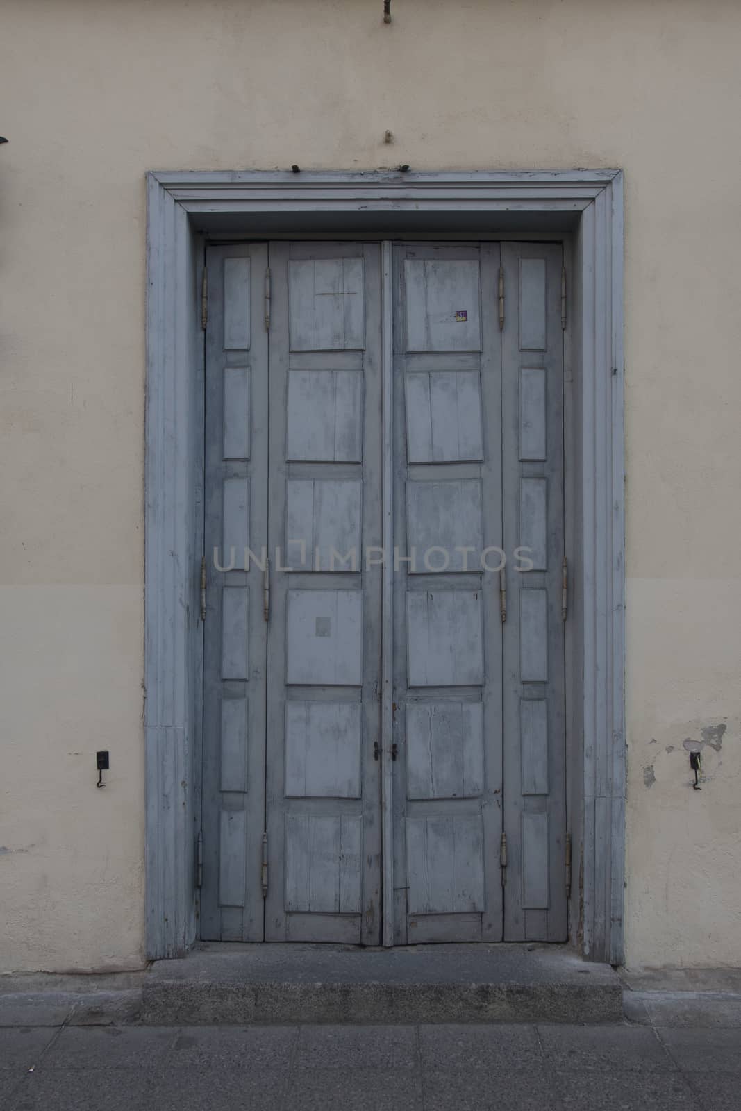 wooden door of middle ages house in old town