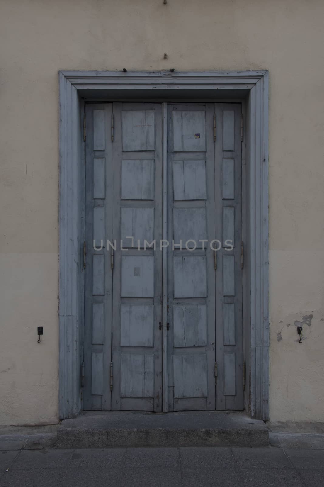 wooden door of middle ages house in old town