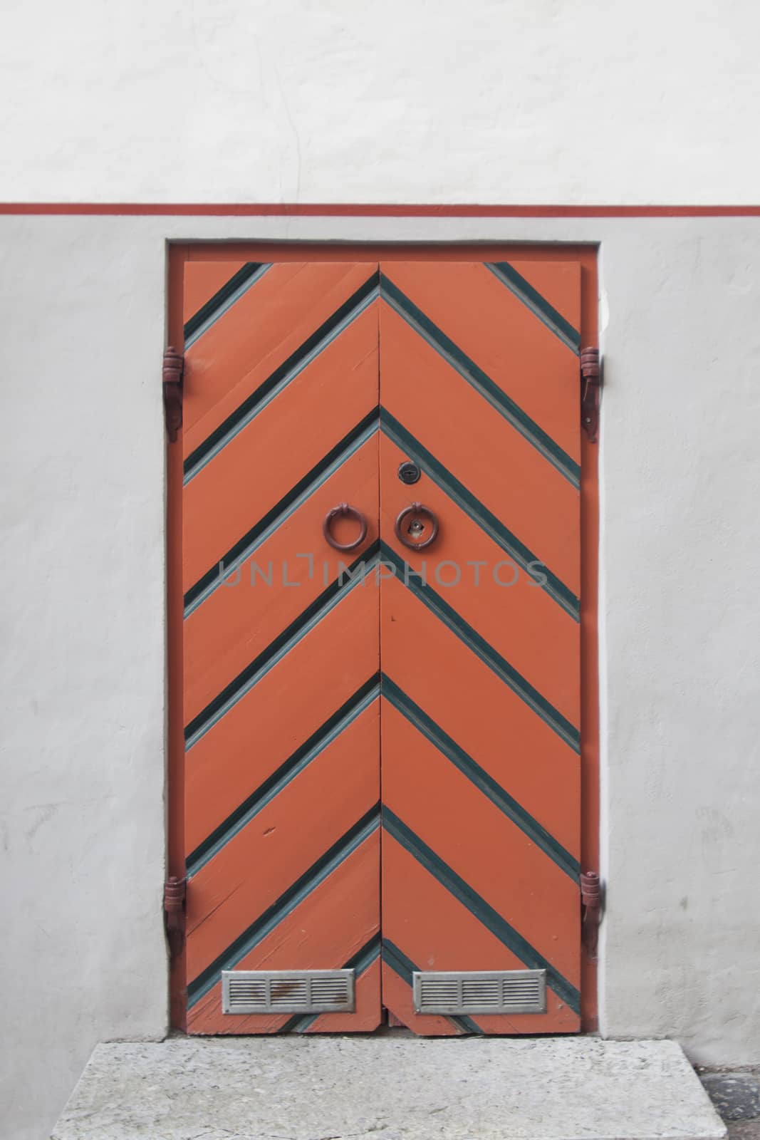 wooden door of middle ages house in old town