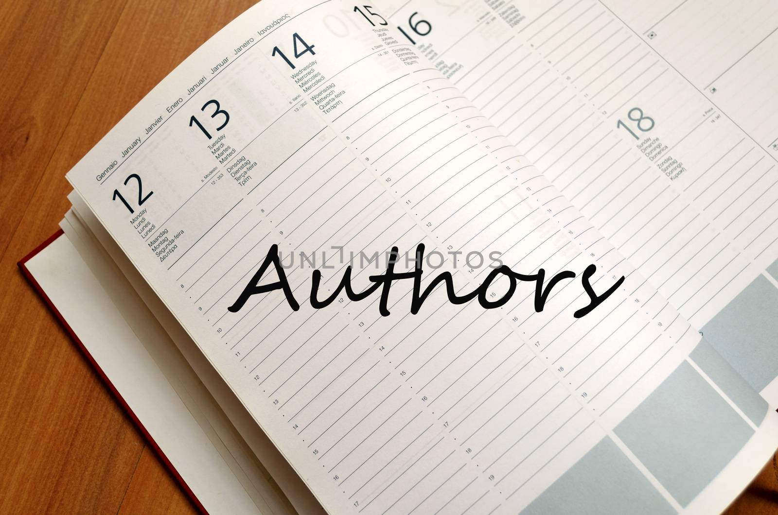 Business Notepad on wooden table Authors concept