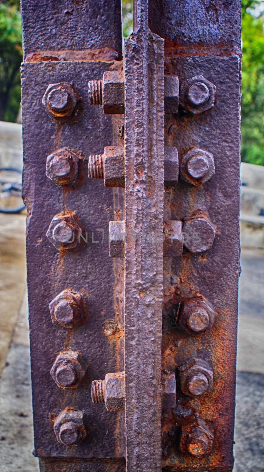 Photograph of some industrial rusty metal screws and nuts