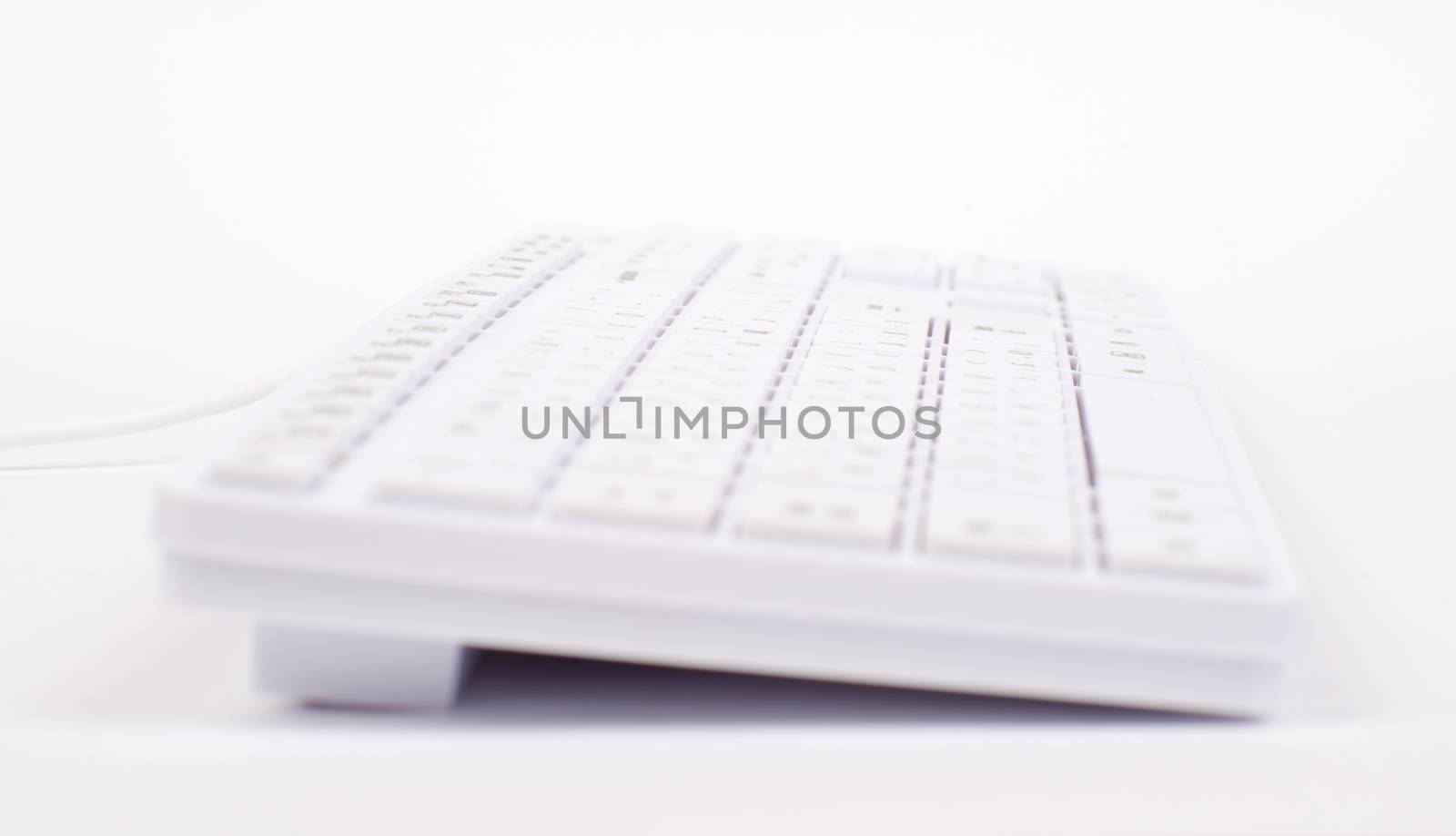 White keyboard with wire by cherezoff