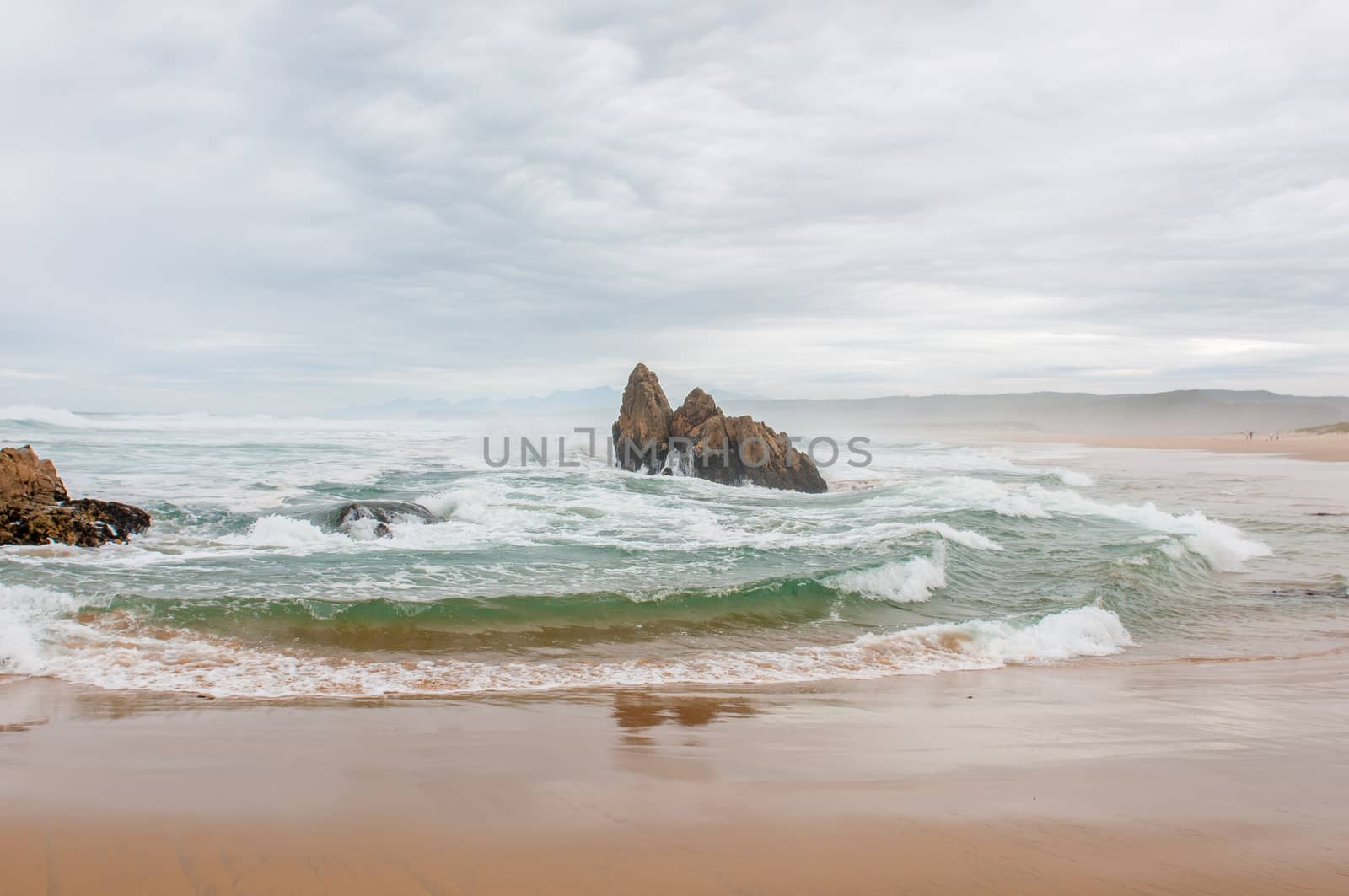 Stormy weather at a beach near Buffelsbaai (Buffalo Bay) at Knysna, South Africa