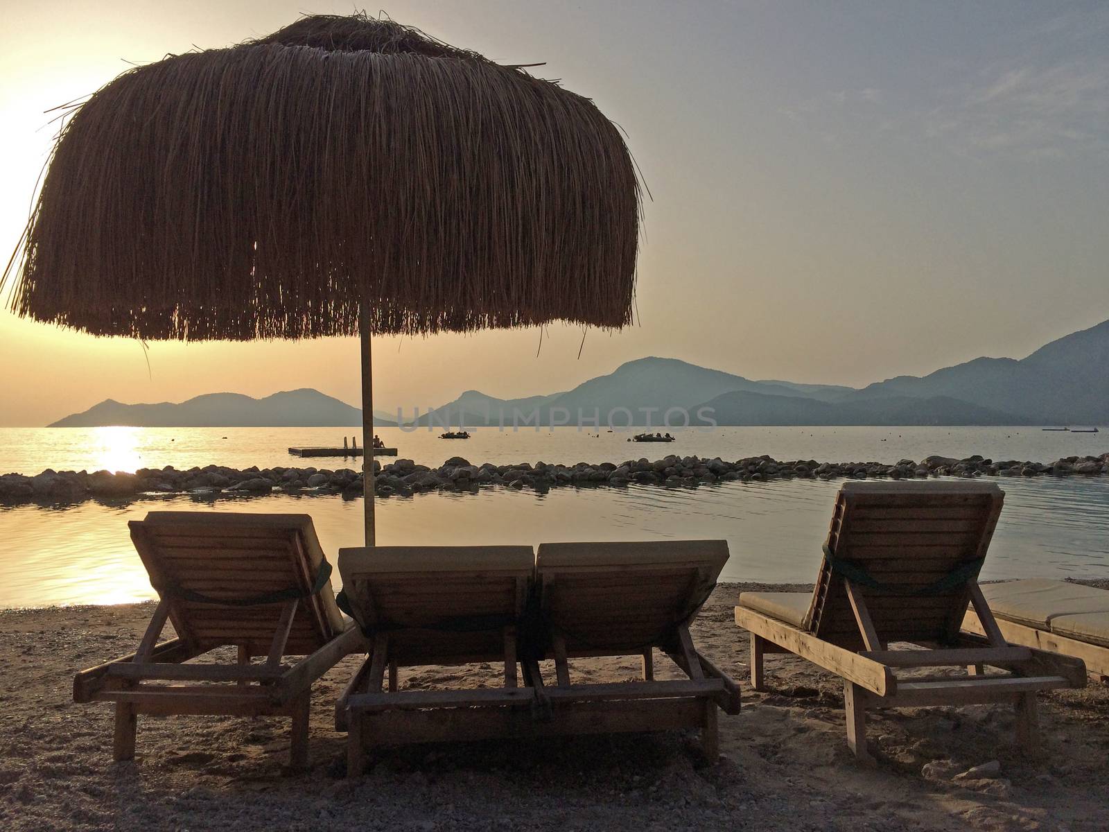 Beach Chairs and Umbrella on a beautiful island