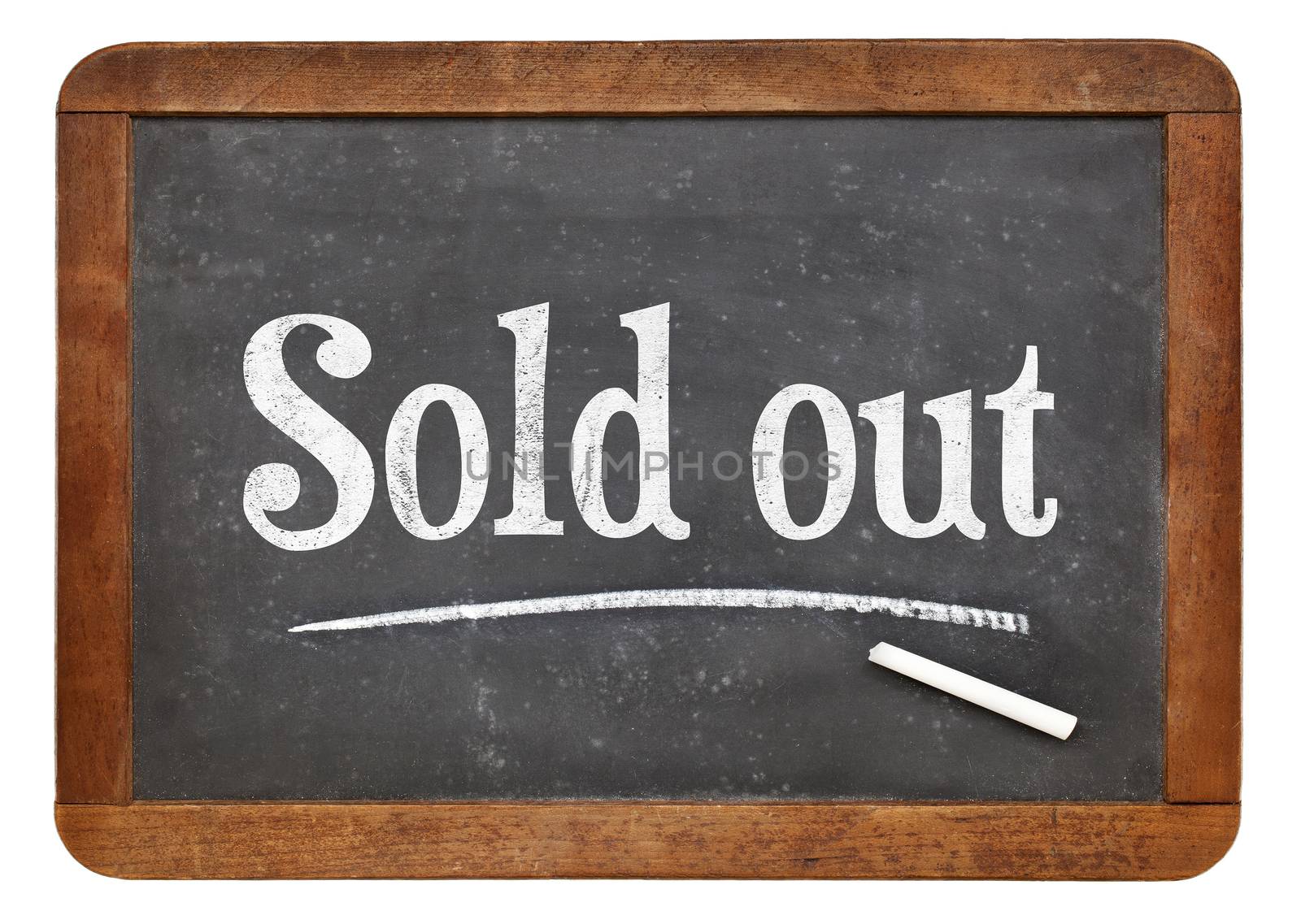 Sold out sign  - white chalk text on an isolated  vintage slate blackboard