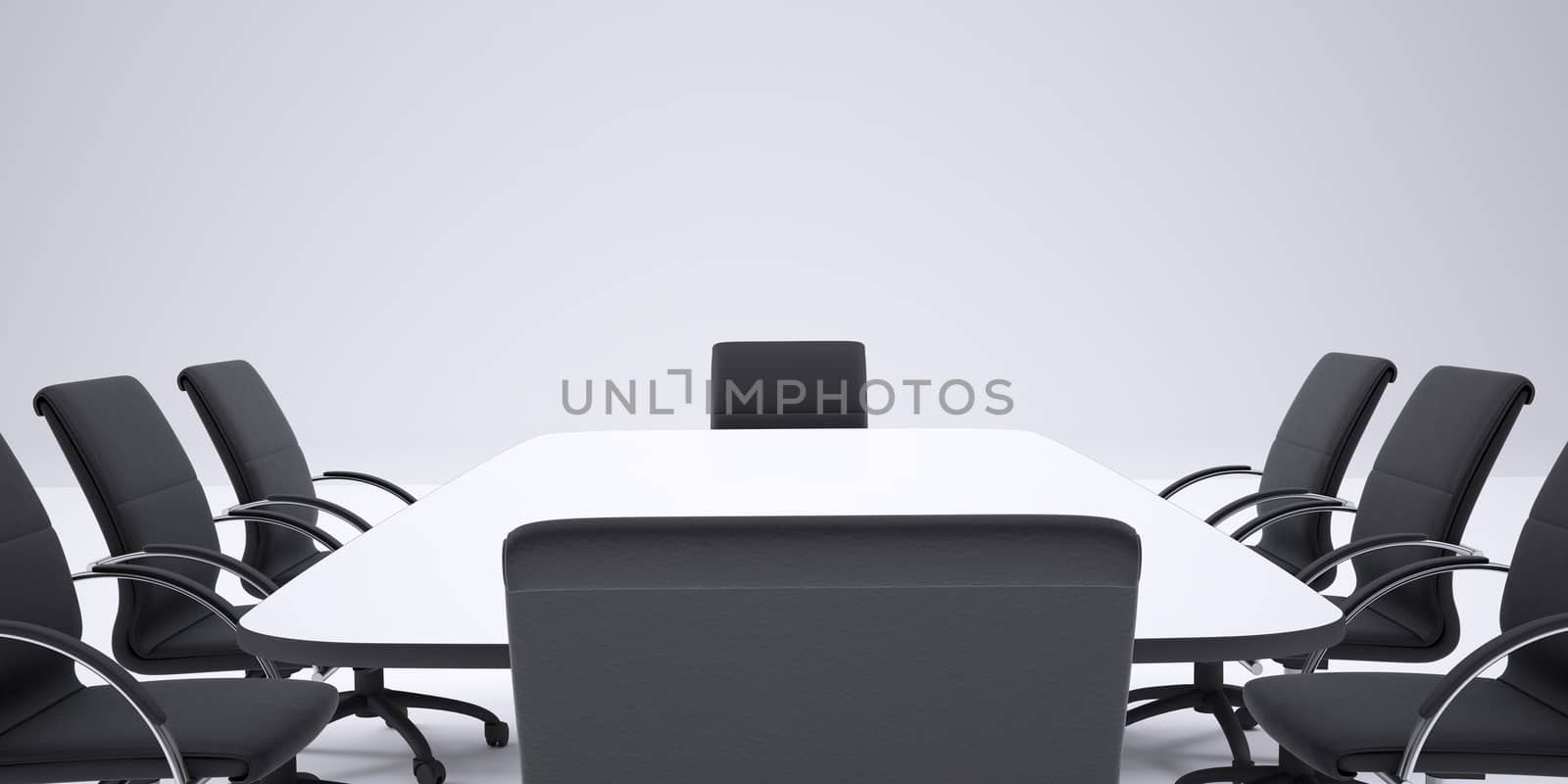 Conference table and black office chairs. Cropped image by cherezoff