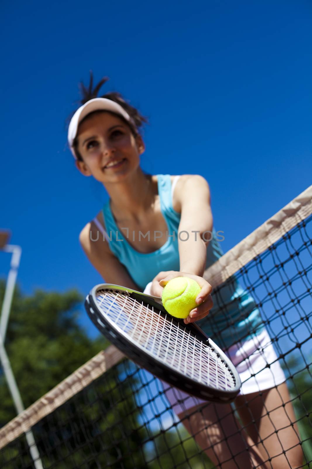 Young woman playing tennis, natural colorful tone