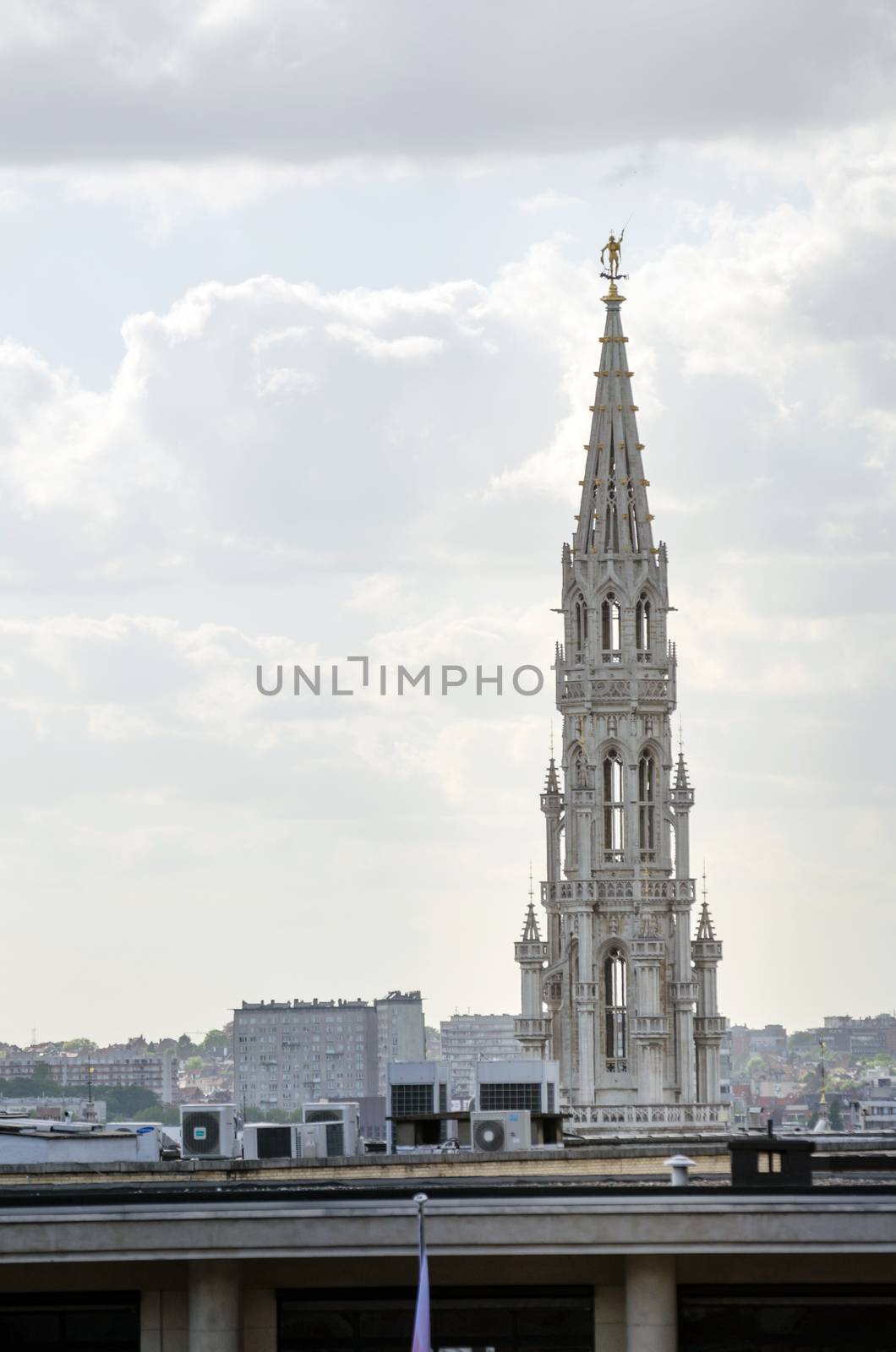 Town hall tower on Grand Place in Brussels. by siraanamwong