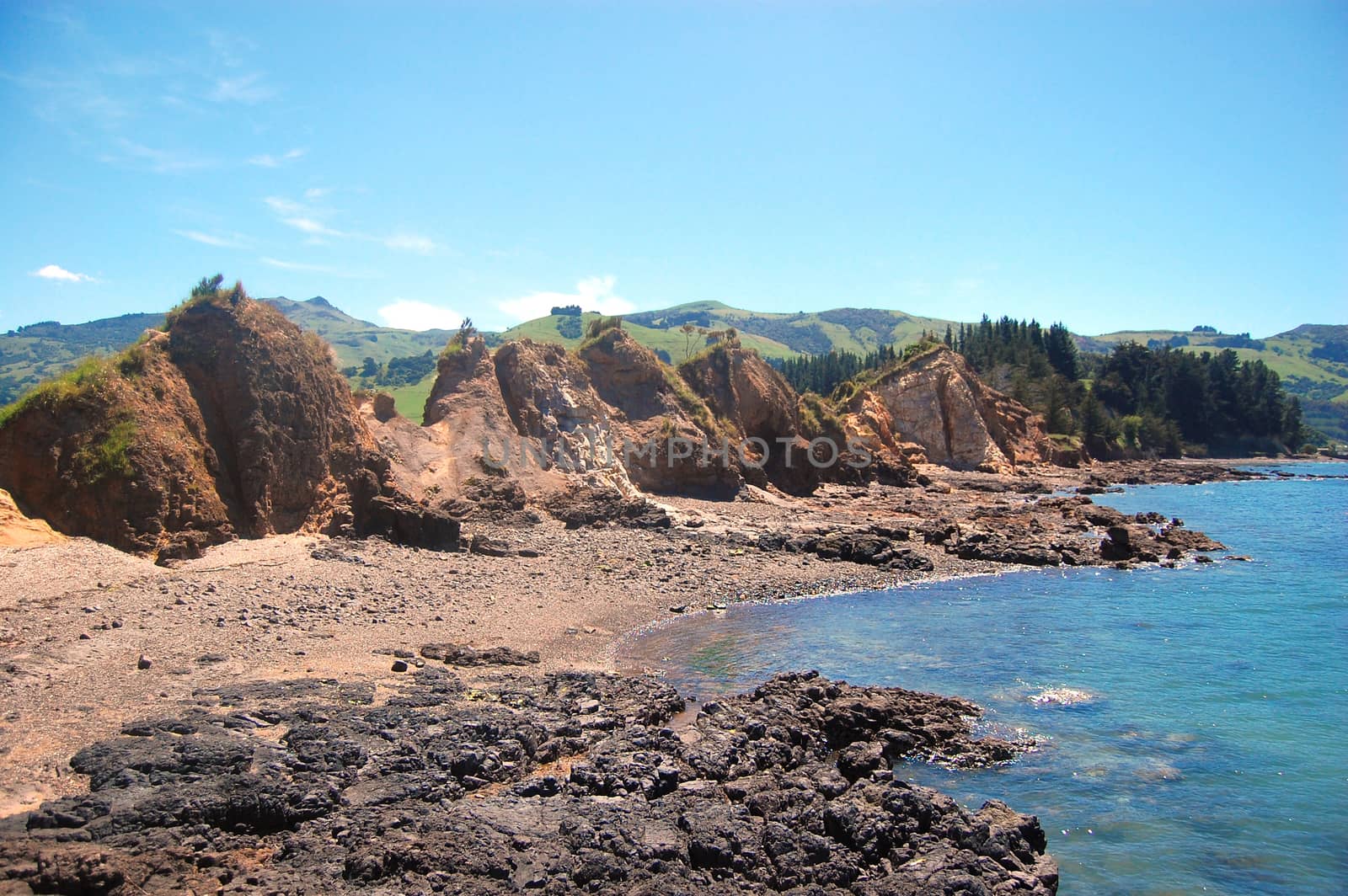 Rocks at stony coast area at Akaroa Bay, New Zealand