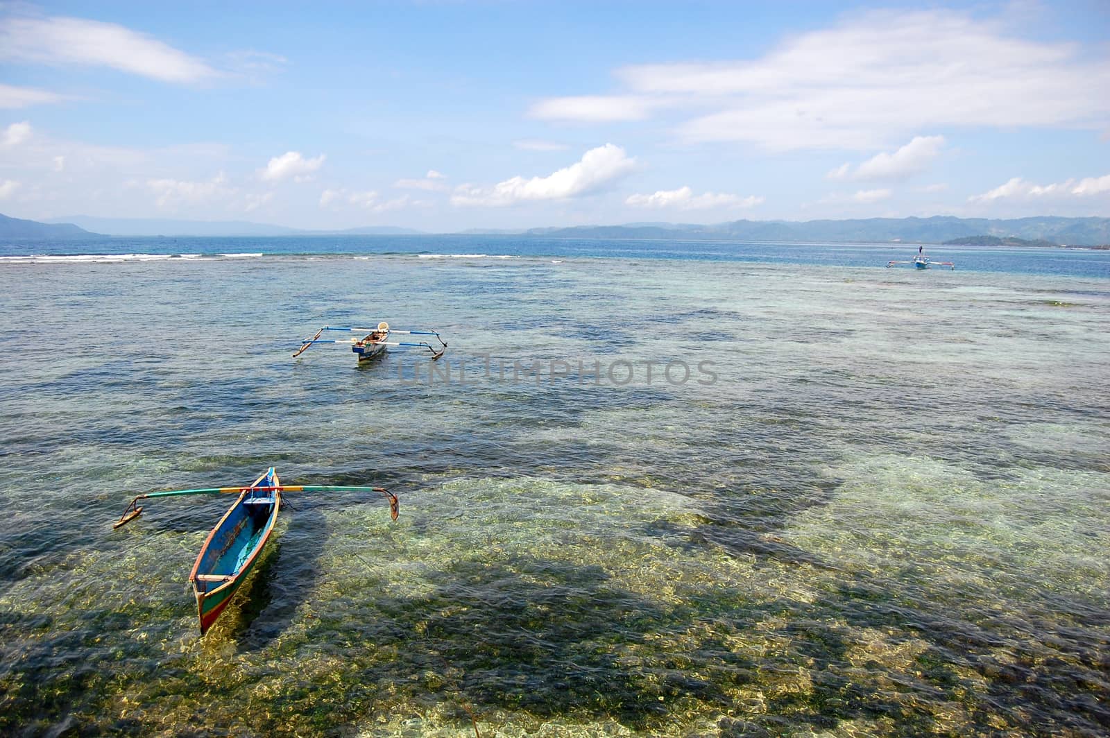 Fishing boats at ocean bay near coast Indonesia, Jayapura