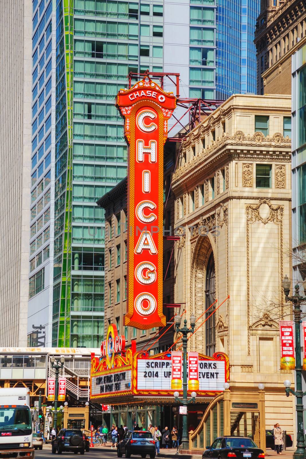 CHICAGO - APRIL 9: Chicago Theather with people on April 09, 2014 in Chicago, IL. It'is a landmark theater located on North State Street in the Loop area of Chicago.