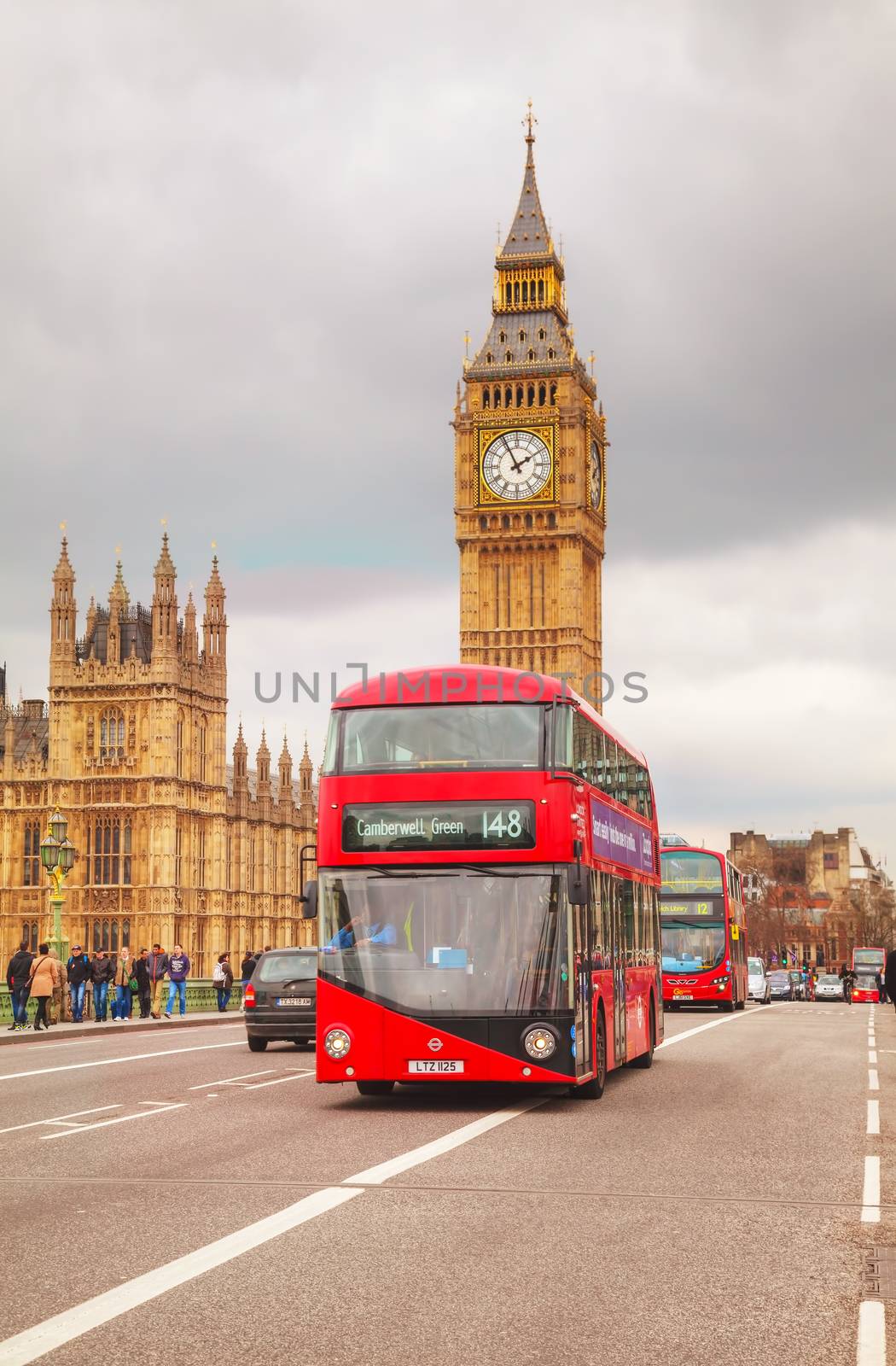 LONDON - APRIL 4: Iconic red double decker bus on April 4, 2015 in London, UK. The London Bus is one of London's principal icons, the archetypal red rear-entrance Routemaster recognised worldwide.