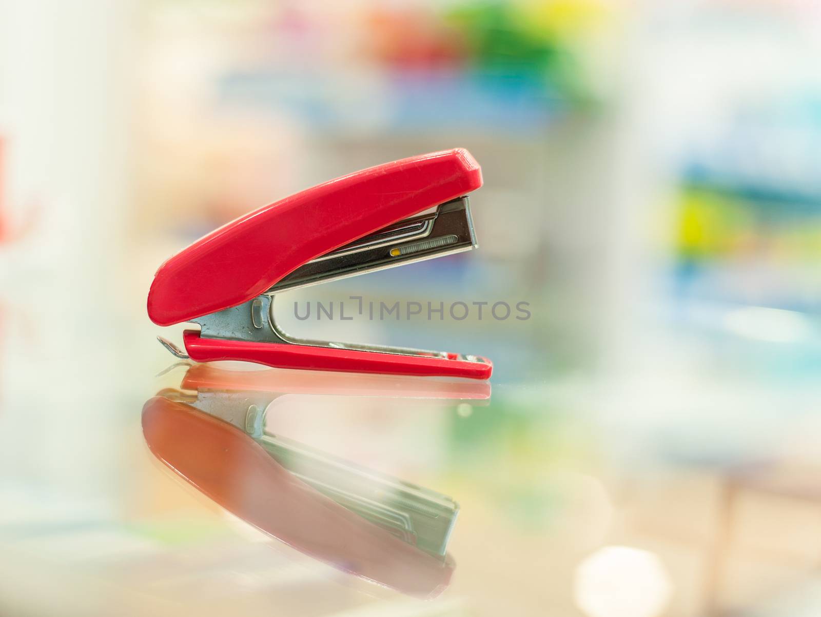 red stapler,Blur background, Soft focus