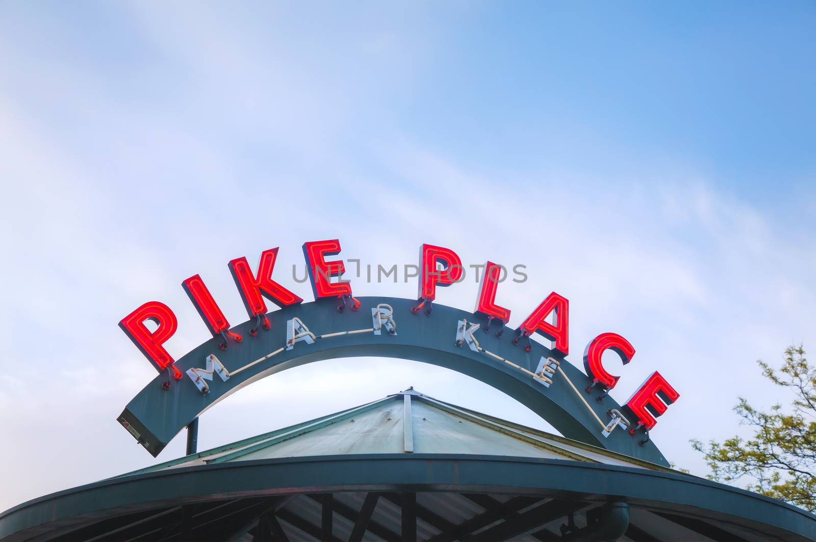 SEATTLE - MAY 9: Famous Pike Place market sign on May 9, 2014 in Seattle, WA. The Market opened in 1907, and is one of the oldest continuously operated public farmers' markets in the US.