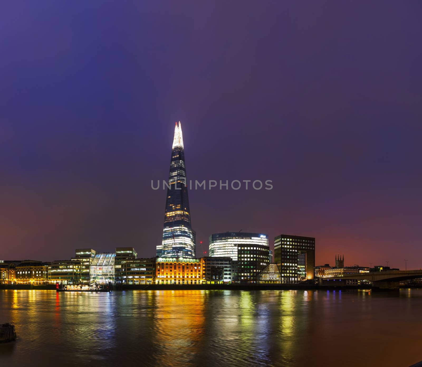 LONDON - APRIL 4: Overview of London with the Shard of Glass on April 4, 2015 in London, UK. Standing 306 metres high, the Shard is currently the tallest building in the European Union.