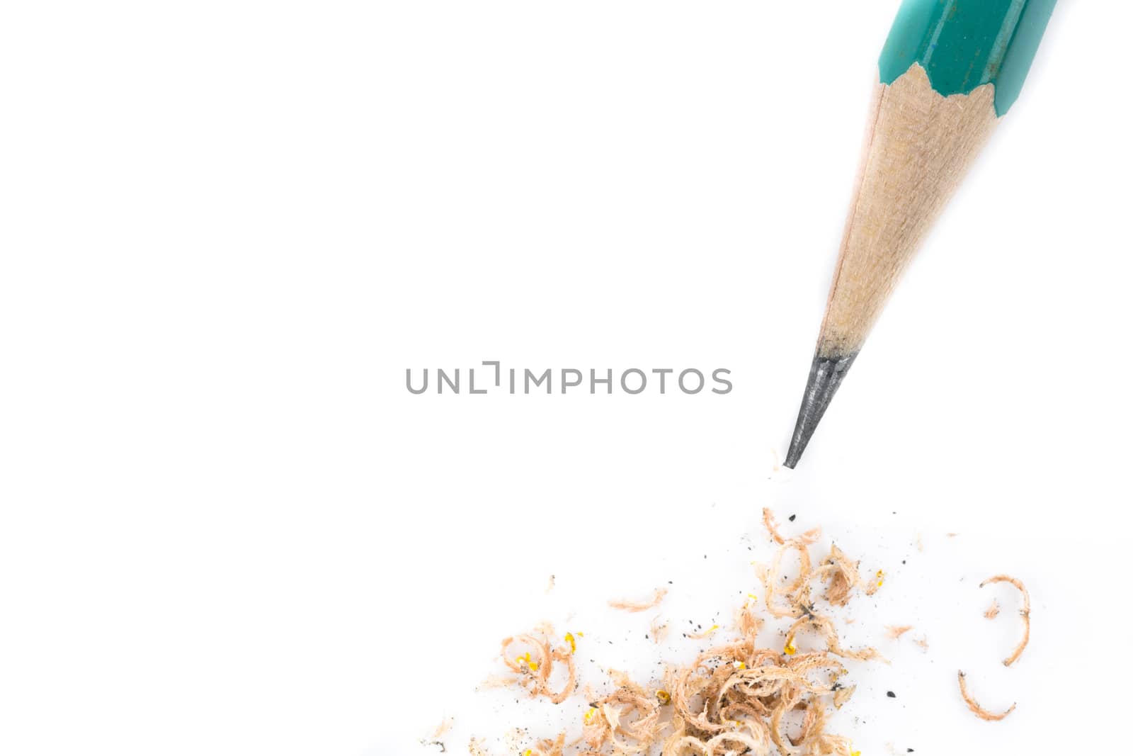 green pencil on white background isolated from top view