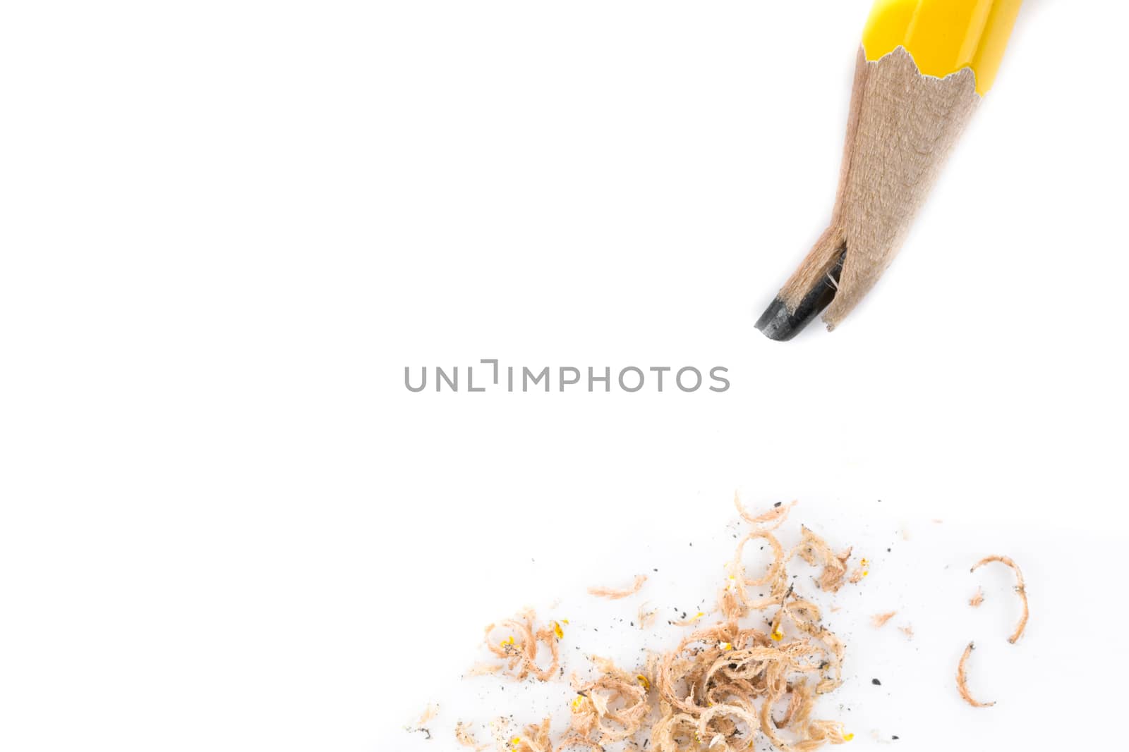 yellow broken pencil on white background isolated from top view