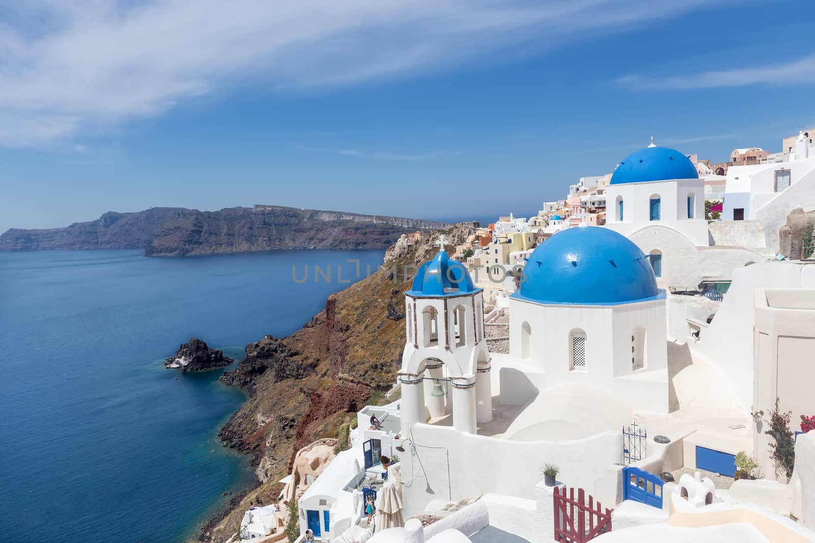 Blue and white church of Oia village on Santorini island. Greece by ververidis